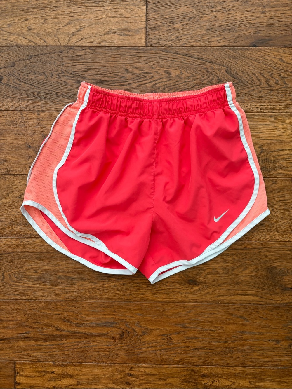 nike dri-fit coral and peach shorts